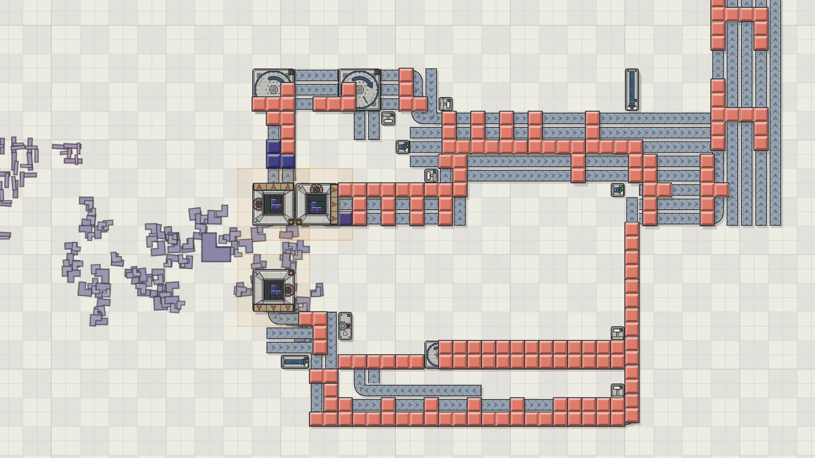 A starter factory: cutters, glue heads and turntables on a red line, with loose blocks scattered on the floor to the left